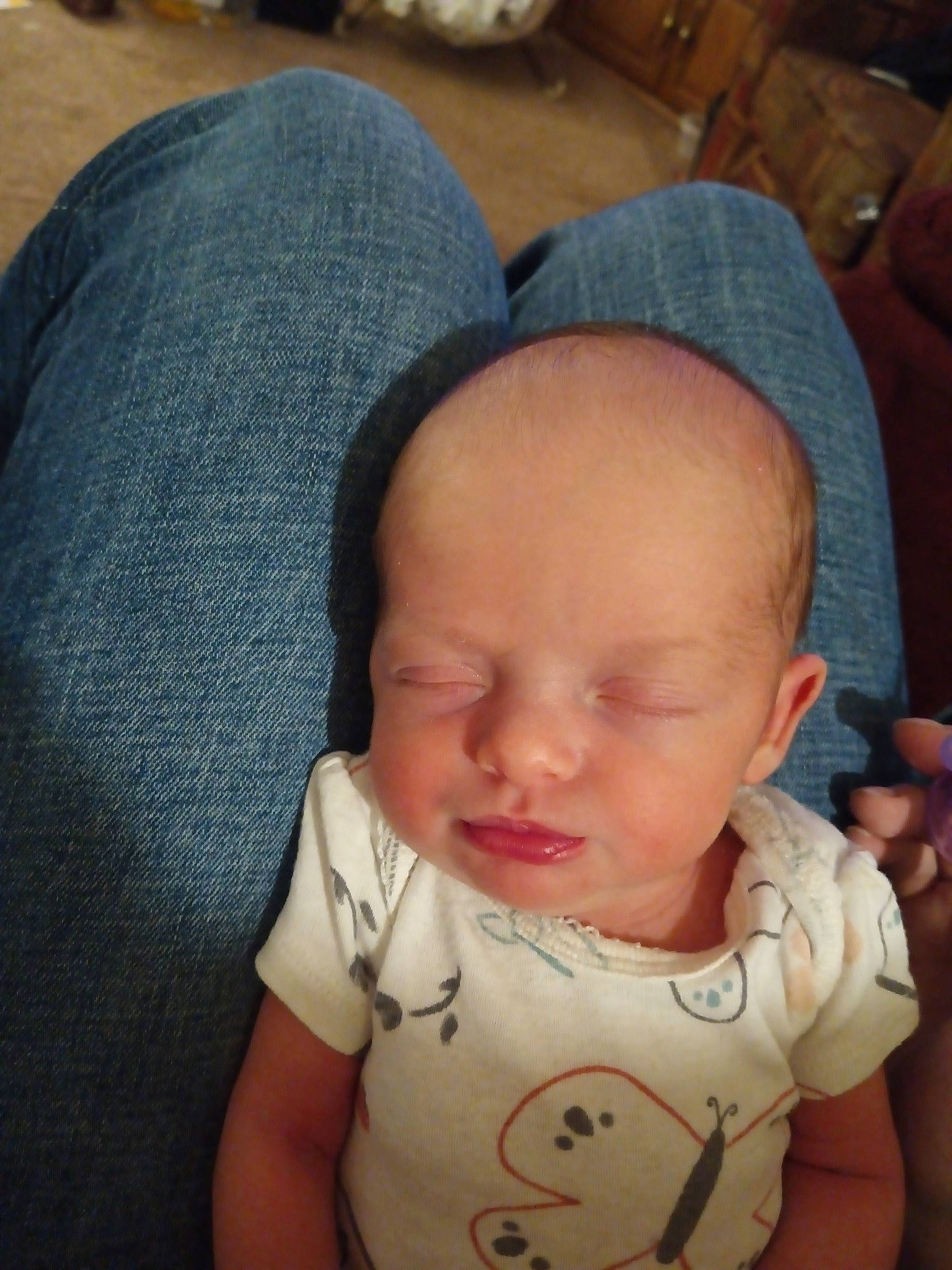 Nykolle is registered to the contest to win money with this photo: baby, baby_toddler_clothing, bib, cap, cheek, child, comfort, eyebrow, finger, happy, iris, lip, mouth, neck, nose, person, sitting, skin, sleeve, smile