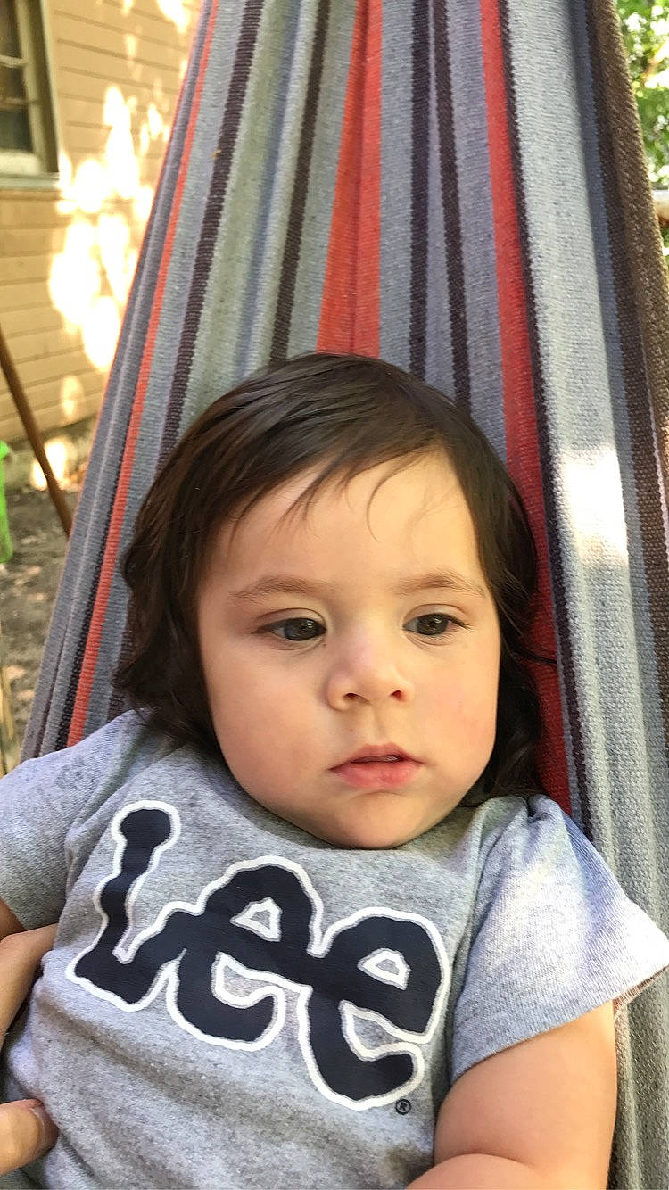 Jedidiah is registered to the contest to win money with this photo: black, black_hair, cheek, chin, eye, eyelash, face, forehead, happy, iris, light, mouth, nose, people, person, photograph, plant, product, skin, sleeve