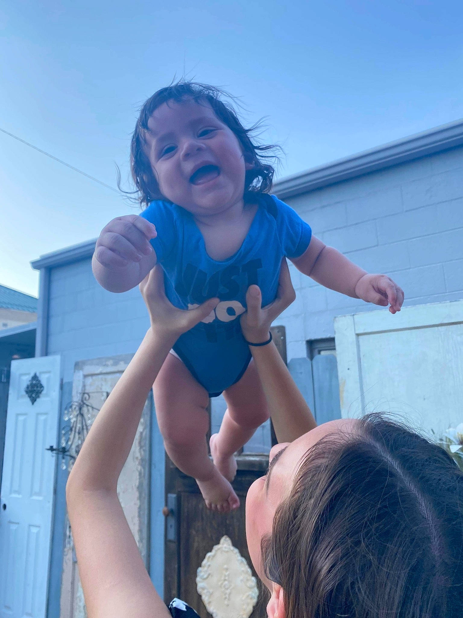 Jedidiah is registered to the contest to win money with this photo: azure, blue, cloud, daytime, electric_blue, fun, gesture, happy, joint, leg, leisure, muscle, person, shoulder, sky, smile, summer, t_shirt, thigh, toddler
