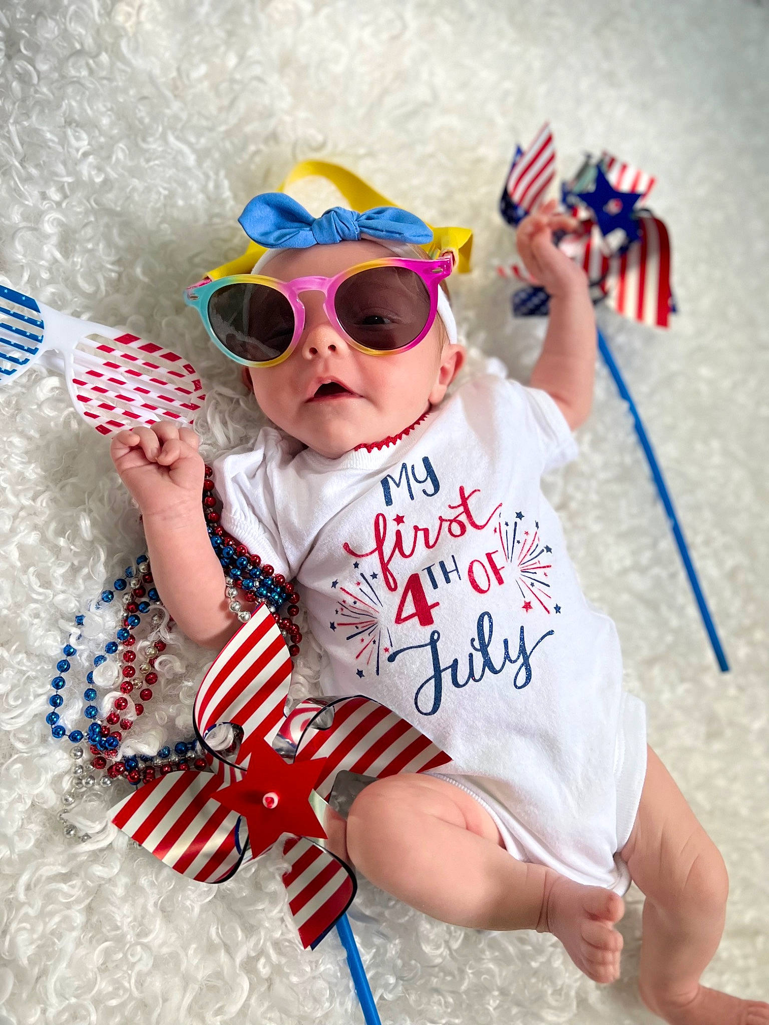 Braylee is registered to the contest to win money with this photo: baby_toddler_clothing, cap, cool, eyewear, face, fun, goggles, hand, happy, hat, headgear, headwear, person, recreation, sleeve, street_fashion, summer, sunglasses, thigh, toddler