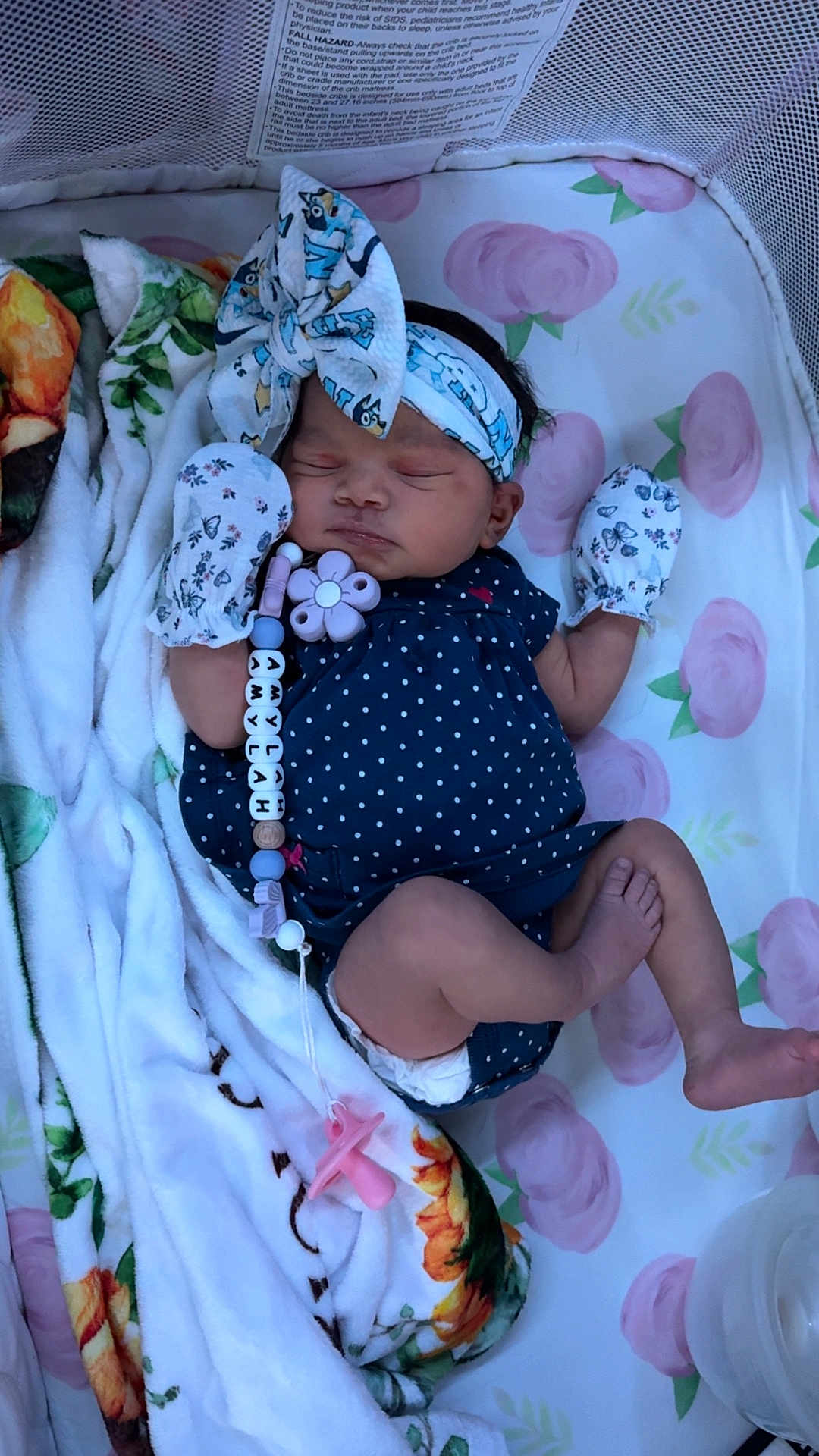 Amylah joined the competition — help win amazing prizes! baby, newborn, sleeping, headband, mittens, polka_dot, pacifier, blanket, floral, crib, mattress, infant, cute, peaceful, clothing, lying_down, indoors, accessory, child, nap