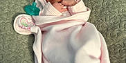 Kenzleigh joined the competition — help win amazing prizes! newborn, baby, blanket, pink, sleeping, pacifier, infant, wrapped, soft, resting, indoors, peaceful, cute, toddler, person, face, skin, head, portrait, cozy