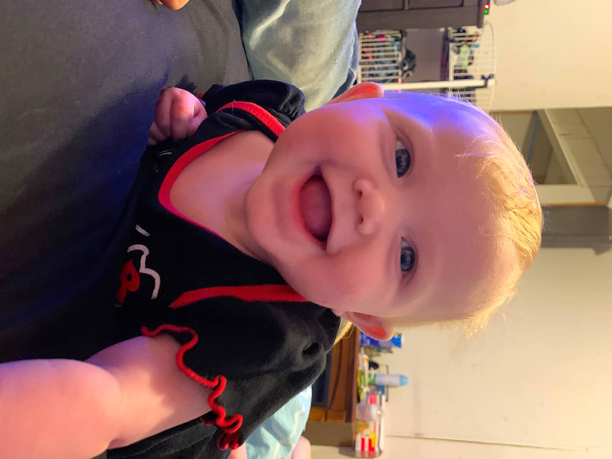 Emma is registered to the contest to win money with this photo: baby, baby_laughing, baby_toddler_clothing, cheek, child, chin, ear, eye, face, fun, happy, head, joy, lip, mouth, nose, orange, person, pink, skin