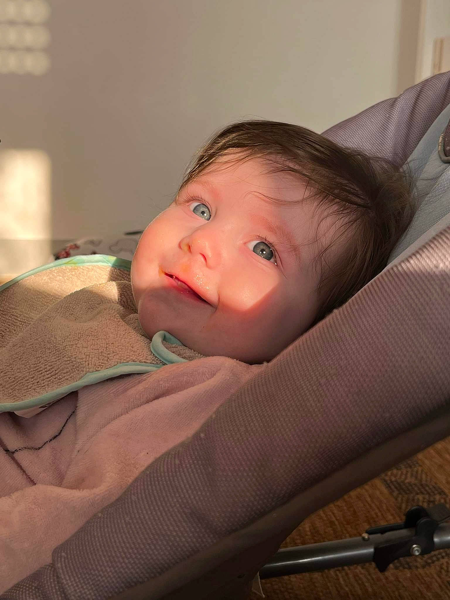 Sally participe au concours pour gagner de l'argent avec cette photo : baby, baby_toddler_clothing, cheek, child, comfort, eye, eyebrow, eyelash, iris, linens, lip, mouth, nose, office_supplies, person, room, skin, sleeve, smile, toddler