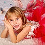 child, girl, smiling, red_dress, white_rug, tulle, floral, holiday, decoration, portrait, happy, resting, face, hands, indoors, cute, young, fashion, celebration, festive