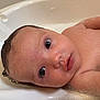baby, bathtub, water, soap_bubbles, skin, face, eyes, infant, wet_hair, bath_time, child, cute, portrait, close_up, curious, young, human, indoors, bath, clean