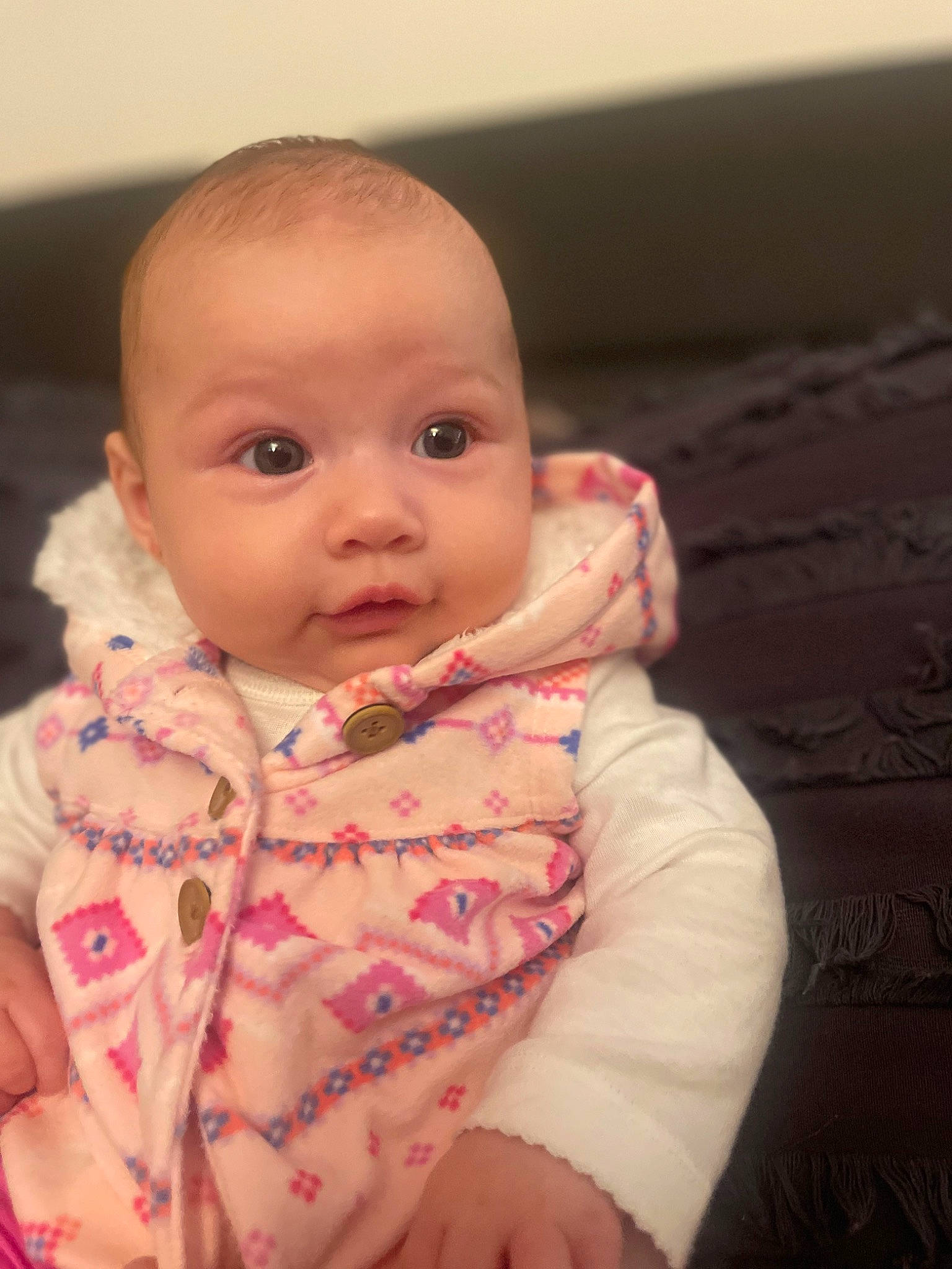 Alyvia is registered to the contest to win money with this photo: arm, baby, baby_toddler_clothing, cheek, comfort, dress, ear, eye, eyebrow, eyelash, finger, happy, head, human_body, iris, lip, neck, nose, person, skin