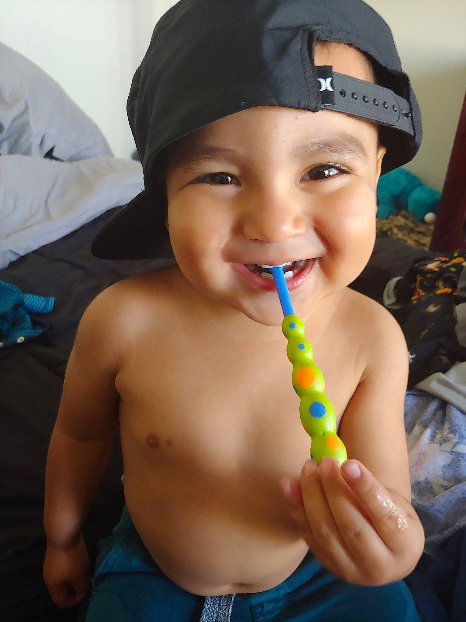 Domenic is registered to the contest to win money with this photo: black_hair, chest, child, eye, eyebrow, face, finger, forehead, fun, head, headgear, joy, lip, mouth, muscle, neck, nose, person, skin, smile