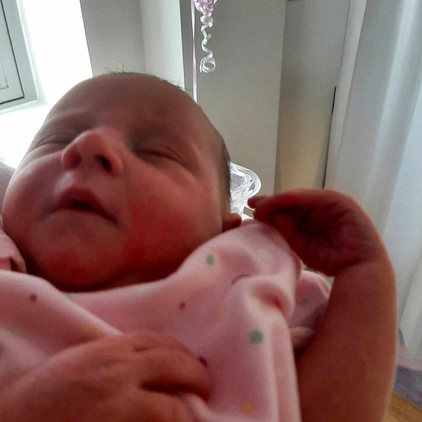 Tessamae is registered to the contest to win money with this photo: baby, blanket, child, closeup, cozy, cute, face, hand, indoors, infant, natural_light, newborn, peaceful, pink_blanket, portrait, resting, sleeping, soft_light, tiny_hands, window