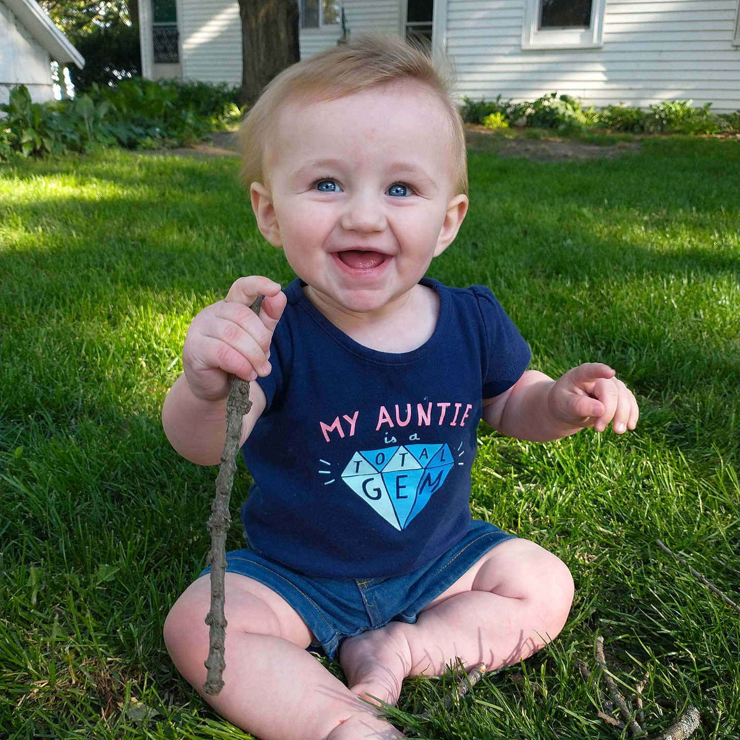 Eleanor joined the competition — help win amazing prizes! baby, backyard, bodypart, clothing, face, finger, grass, hand, head, lawn, nature, outdoors, person, photography, plant, portrait, soil, t_shirt, tree, yard