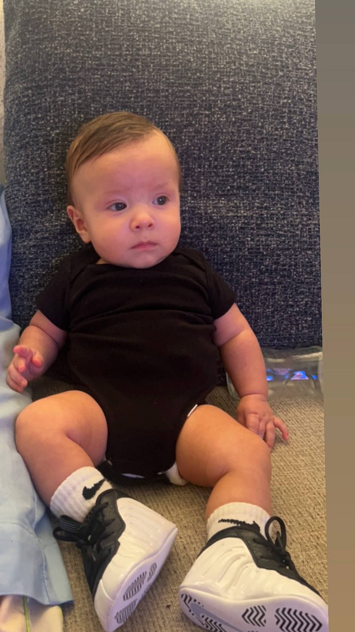 Jiraiya is registered to the contest to win money with this photo: baby, baby_toddler_clothing, cheek, comfort, elbow, finger, foot, head, human_leg, iris, joint, knee, leg, neck, person, shoulder, skin, sleeve, sock, thigh