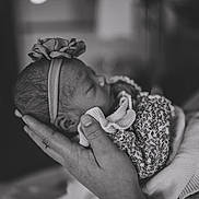 Afinna is registered to the contest to win money with this photo: baby, bodypart, cap, childbirth, clothing, face, finger, hand, hat, head, newborn, person, photography, portrait, sleeping, wristwatch