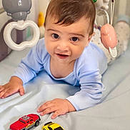 David participe au concours pour gagner de l'argent avec cette photo : baby, car, clothing, crawling, face, happy, head, legoset, machine, medication, person, photography, pill, portrait, sleeve, smile, toy, transportation, vehicle, wheel