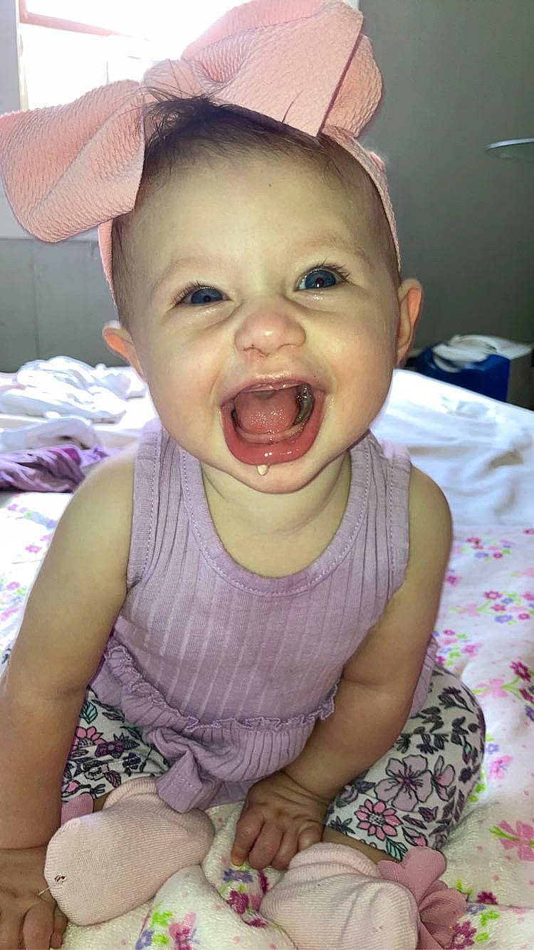Rosalind joined the competition — help win amazing prizes! baby_toddler_clothing, cheek, chin, clothing, eye, face, finger, gesture, happy, head, iris, lip, mouth, nose, person, pink, skin, sleeve, smile, tongue