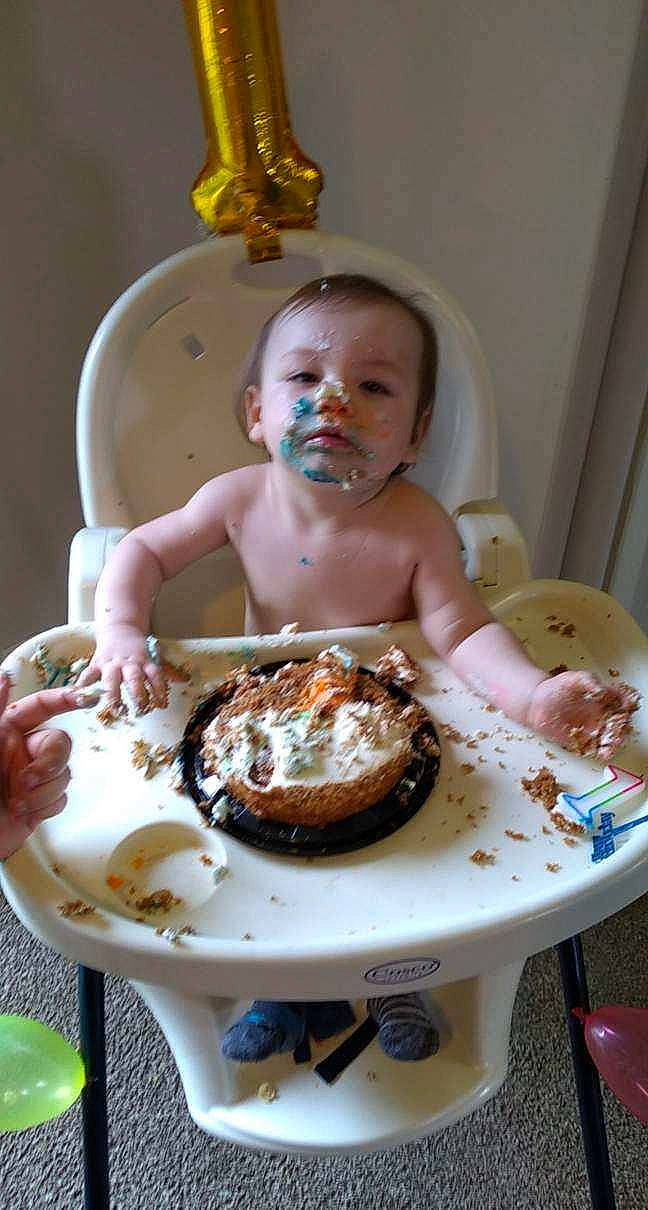 Russell is registered to the contest to win money with this photo: baked_goods, birthday, birthday_cake, buttercream, cake, cake_decorating, child, cuisine, dessert, dish, eating, food, frozen_dessert, icing, ingredient, party, person, pudding, toddler
