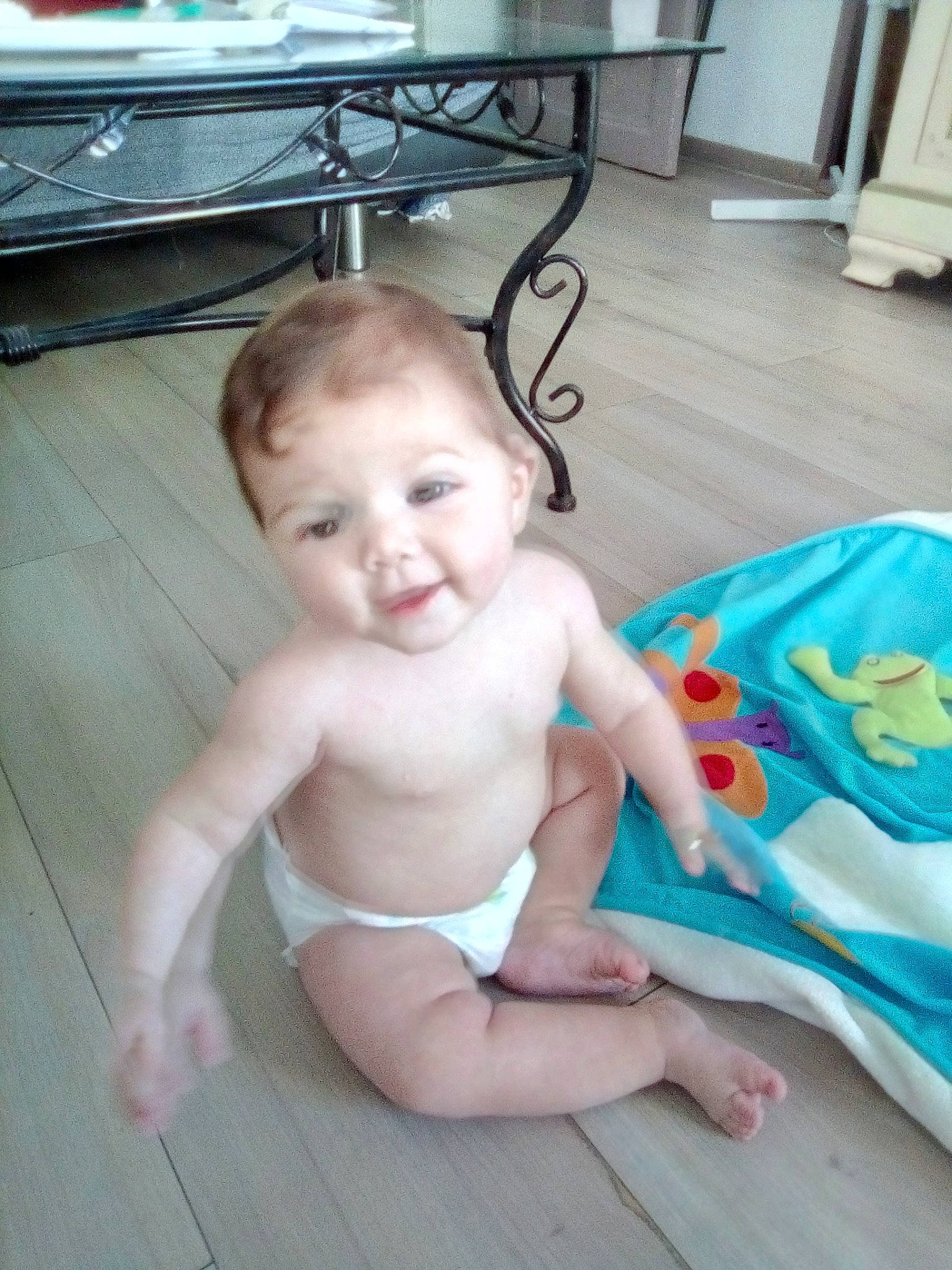 May-ly participe au concours pour gagner de l'argent avec cette photo : baby, baby_toddler_clothing, cheek, child, diaper, floor, head, leg, person, product, sitting, skin, smile, toddler