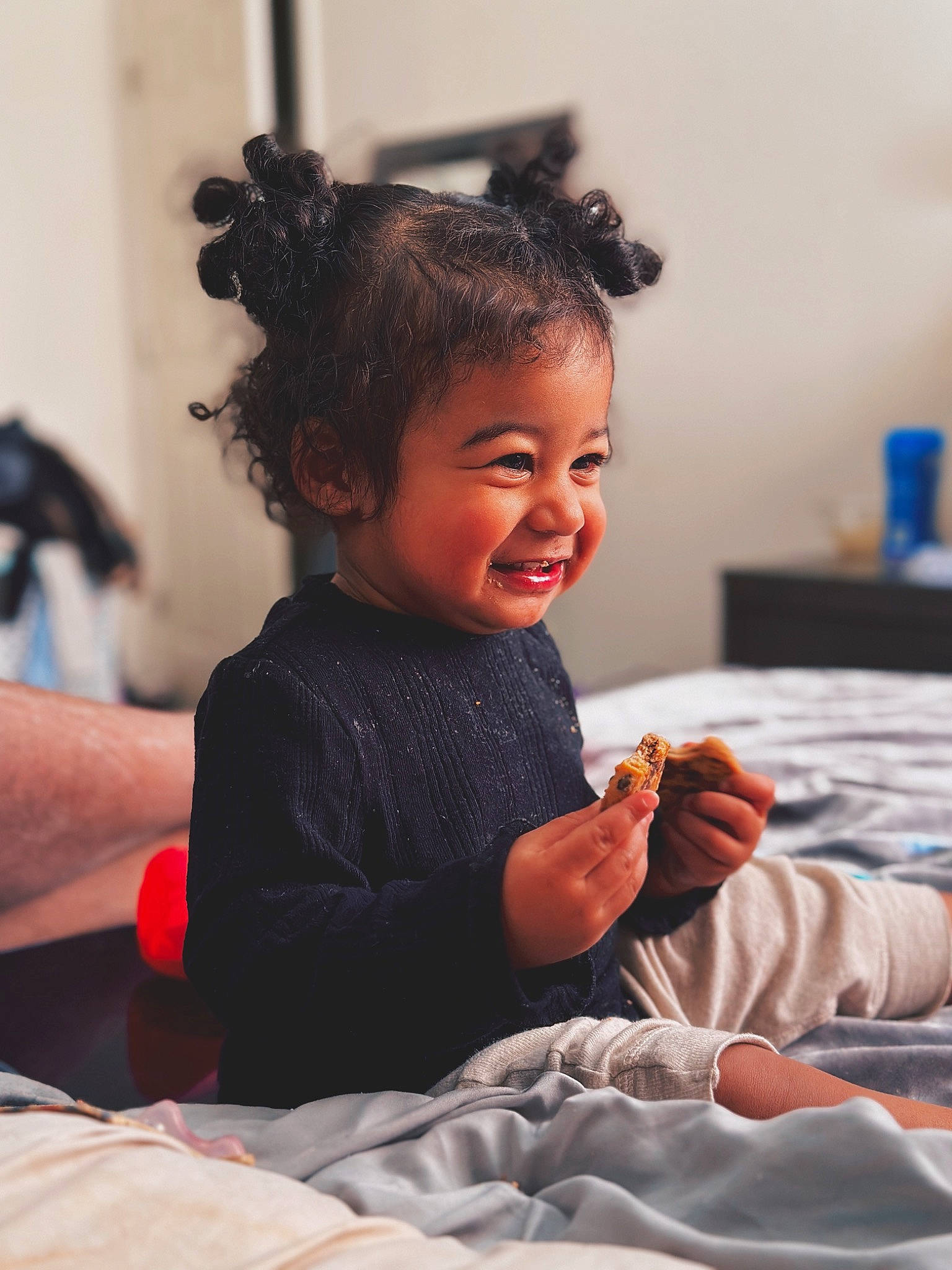 Milani joined the competition — help win amazing prizes! baby, cheek, child, comfort, event, facial_expression, fashion_design, flash_photography, flooring, fun, happy, leisure, linens, person, room, sitting, skin, sleeve, smile, toddler