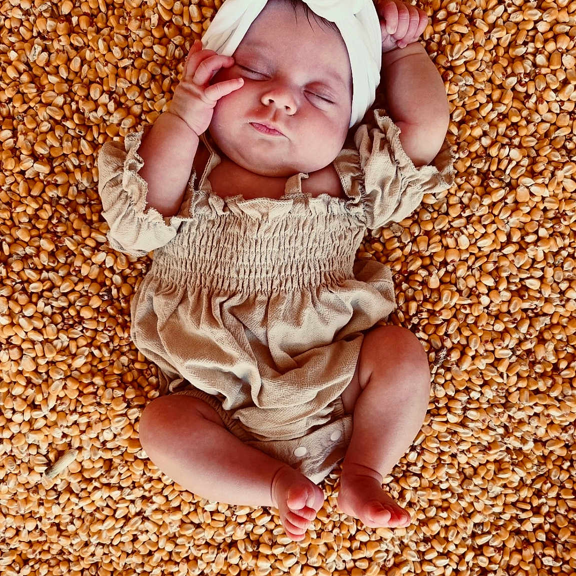 Harliegh joined the competition — help win amazing prizes! baby, beige_clothing, child, close_up, cozy, cute, head_wrap, infant, lying_down, natural_light, peaceful, popcorn_kernels, portrait, relaxation, skin, sleeping, small_feet, small_hands, soft_fabric, texture