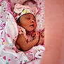 Alani joined the competition — help win amazing prizes! baby, blanket, child, cozy, cute, cute_clothing, face, floral, hat, indoors, infant, newborn, peaceful, pink, portrait, resting, sleeping, soft, toddler, wrapped