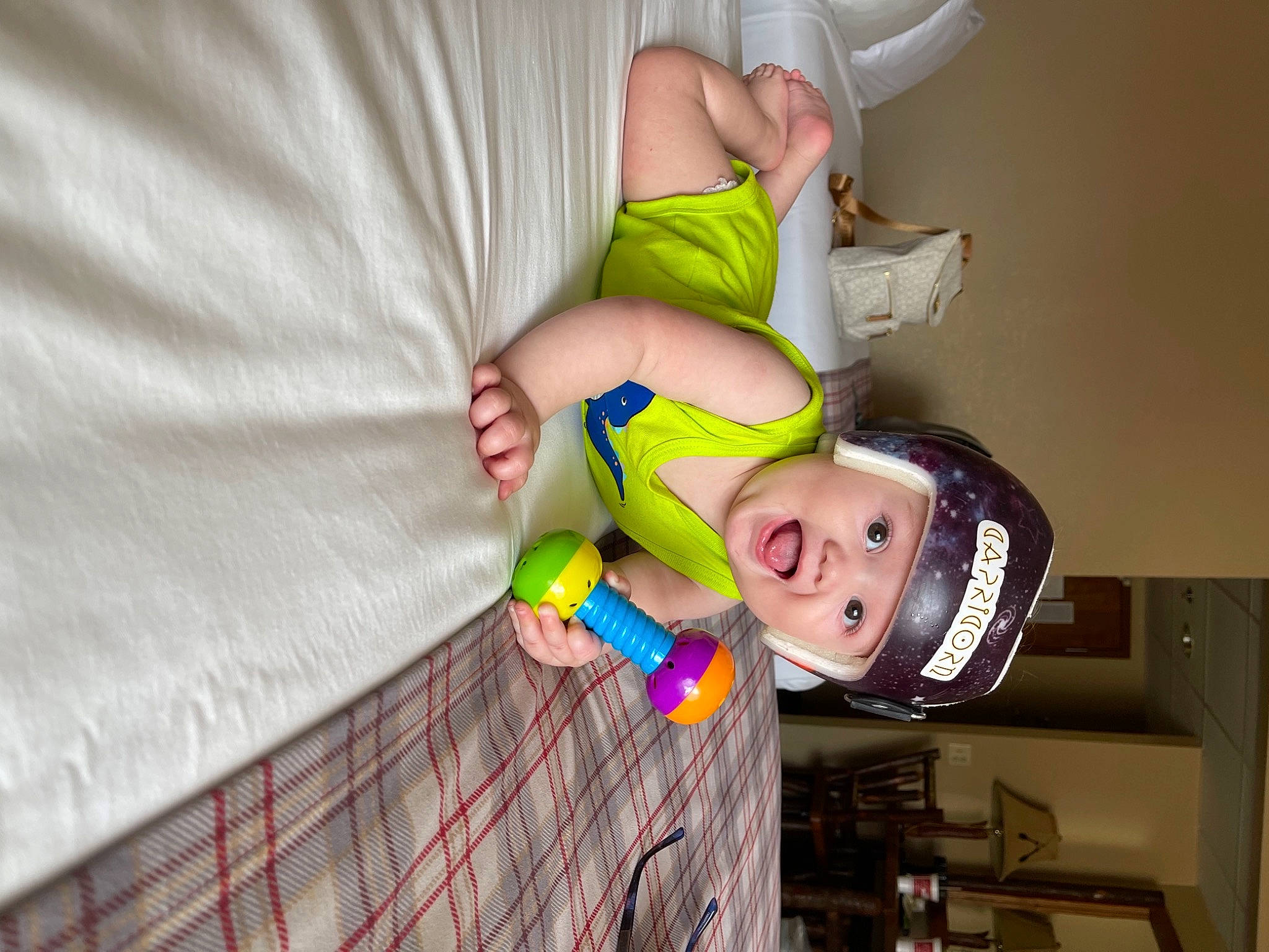 Marcellus joined the competition — help win amazing prizes! baby, baby_products, child, comfort, elbow, fun, gesture, happy, headwear, linens, pattern, person, plaid, room, smile, t_shirt, toddler, wood, wrist