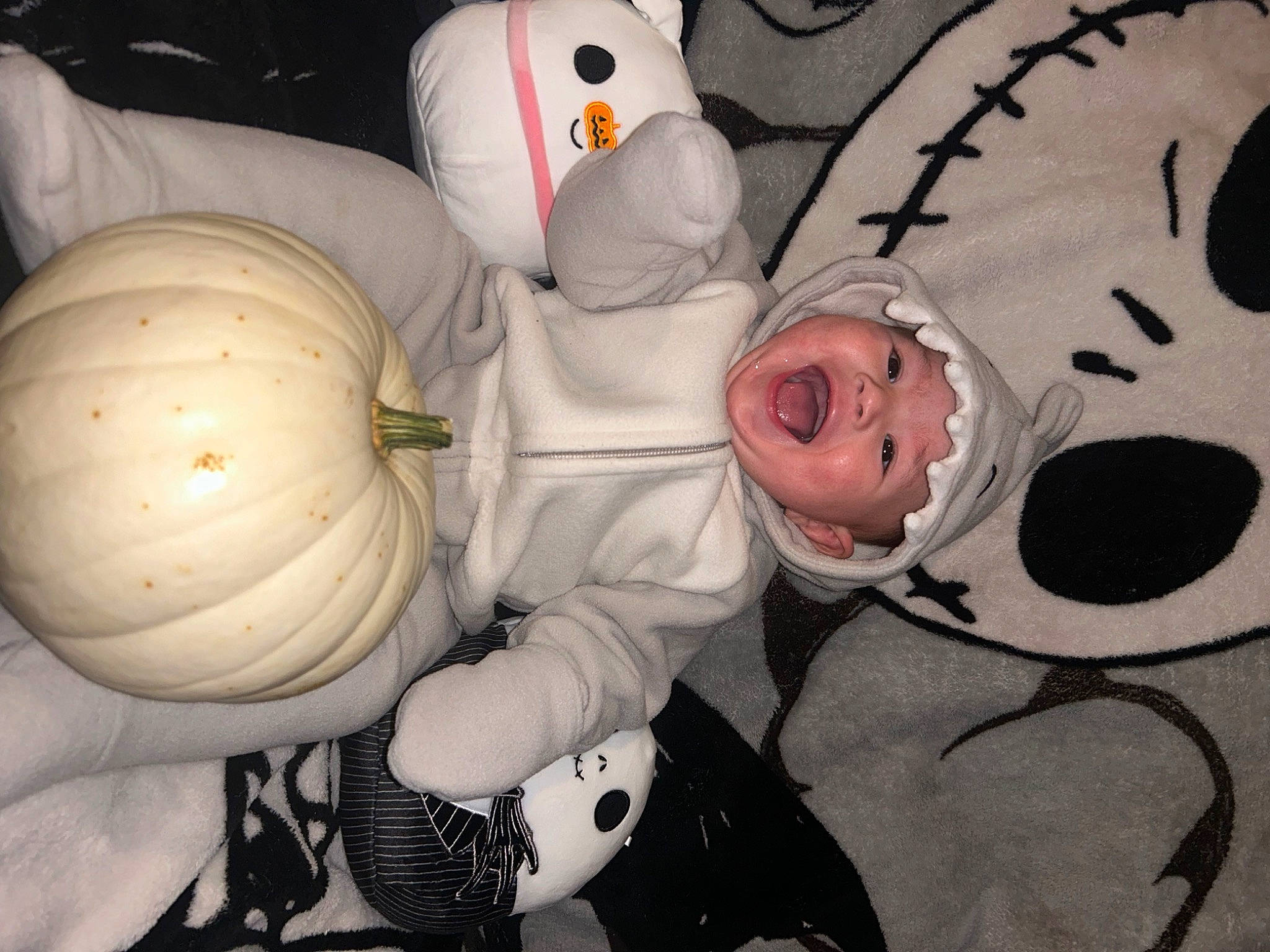 Bellamy is registered to the contest to win money with this photo: baby_products, baby_toys, carmine, child, fashion_accessory, glove, headgear, headwear, linens, pattern, person, personal_protective_equipment, plush, room, stuffed_toy, toy