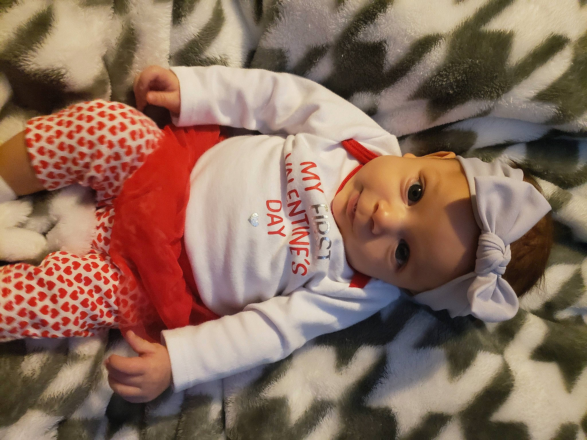 Makyah is registered to the contest to win money with this photo: baby, baby_sleeping, baby_toddler_clothing, bedtime, carmine, child, comfort, fur, happy, hat, head, headwear, linens, pattern, person, plant, portrait_photography, room, sitting, sleeve