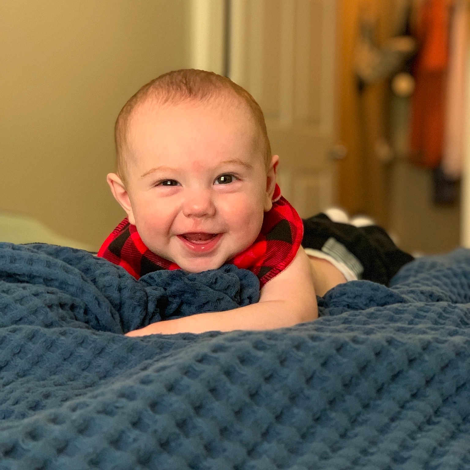 Ty is registered to the contest to win money with this photo: baby, cheek, child, chin, face, head, joy, person, sitting, skin, smile, toddler