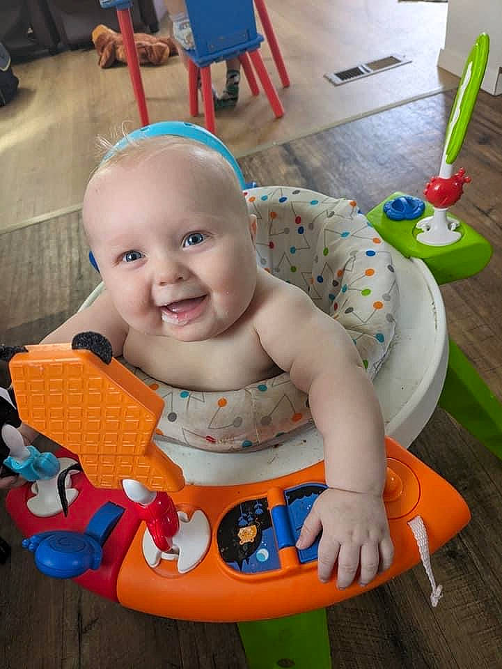 Levi is registered to the contest to win money with this photo: baby, baby_playing_with_toys, baby_products, baby_toddler_clothing, baby_toys, chair, cheek, child, fun, happy, head, joy, kitchen_utensil, leisure, person, play, product, room, sitting, smile