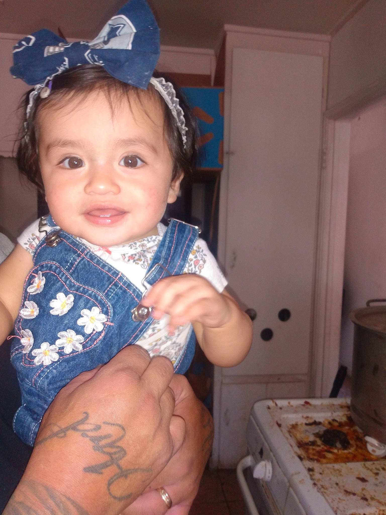 Jeannette is registered to the contest to win money with this photo: baby, baby_toddler_clothing, cap, costume_hat, door, elbow, electric_blue, finger, happy, headband, headpiece, joy, nail, person, skin, sleeve, smile, tattoo, thumb, toddler