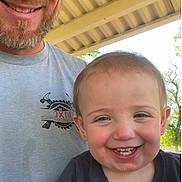 Maylee joined the competition — help win amazing prizes! toddler, child, man, smiling, apple, outdoor, portrait, happy, food, eating, beard, casual_clothing, daylight, head_and_shoulders, family, bonding, roof, nature, person, closeup