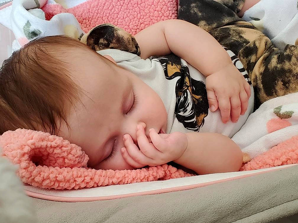 Bonnie joined the competition — help win amazing prizes! arm, baby, baby_sleeping, baby_toddler_clothing, beauty, cheek, comfort, eyelash, facial_expression, finger, hand, headgear, linens, lip, mouth, neck, person, pink, skin, textile