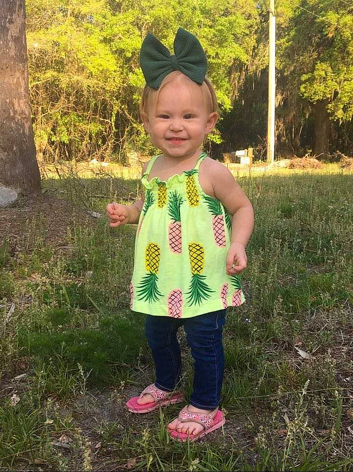 Marianna joined the competition — help win amazing prizes! baby_toddler_clothing, eye, face, fun, garden, grass, grassland, happy, head, human_body, joy, leisure, meadow, pattern, people_in_nature, person, plant, sleeve, smile, t_shirt