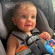 Colt joined the competition — help win amazing prizes! baby, blue_eyes, car_interior, car_seat, child, closeup, colorful, cute, graco, happy, harness, infant, portrait, safety, seatbelt, smile, striped_shirt, sunlight, toy, young_child