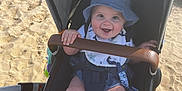 Xander-Richie joined the competition — help win amazing prizes! accessories, baby, beach, cap, clothing, coast, face, hat, head, hosiery, nature, outdoors, person, photography, portrait, sea, sock, stroller, sunglasses, sunhat