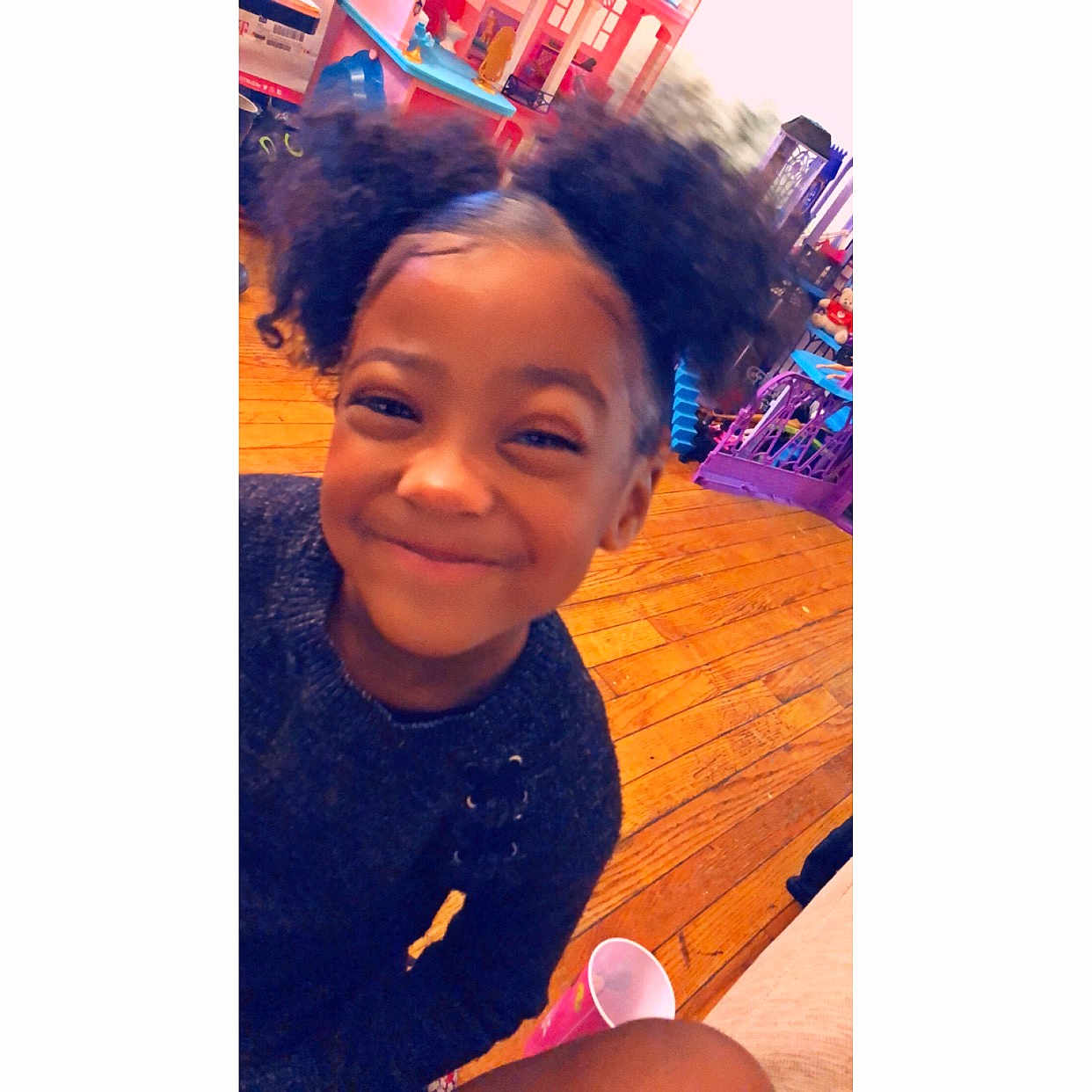 Chasity is registered to the contest to win money with this photo: afro, cheek, child, child_model, ear, forehead, fun, girl, hair, hair_accessory, hair_coloring, hairstyle, joy, person, play, product, purple, selfie, smile, toddler