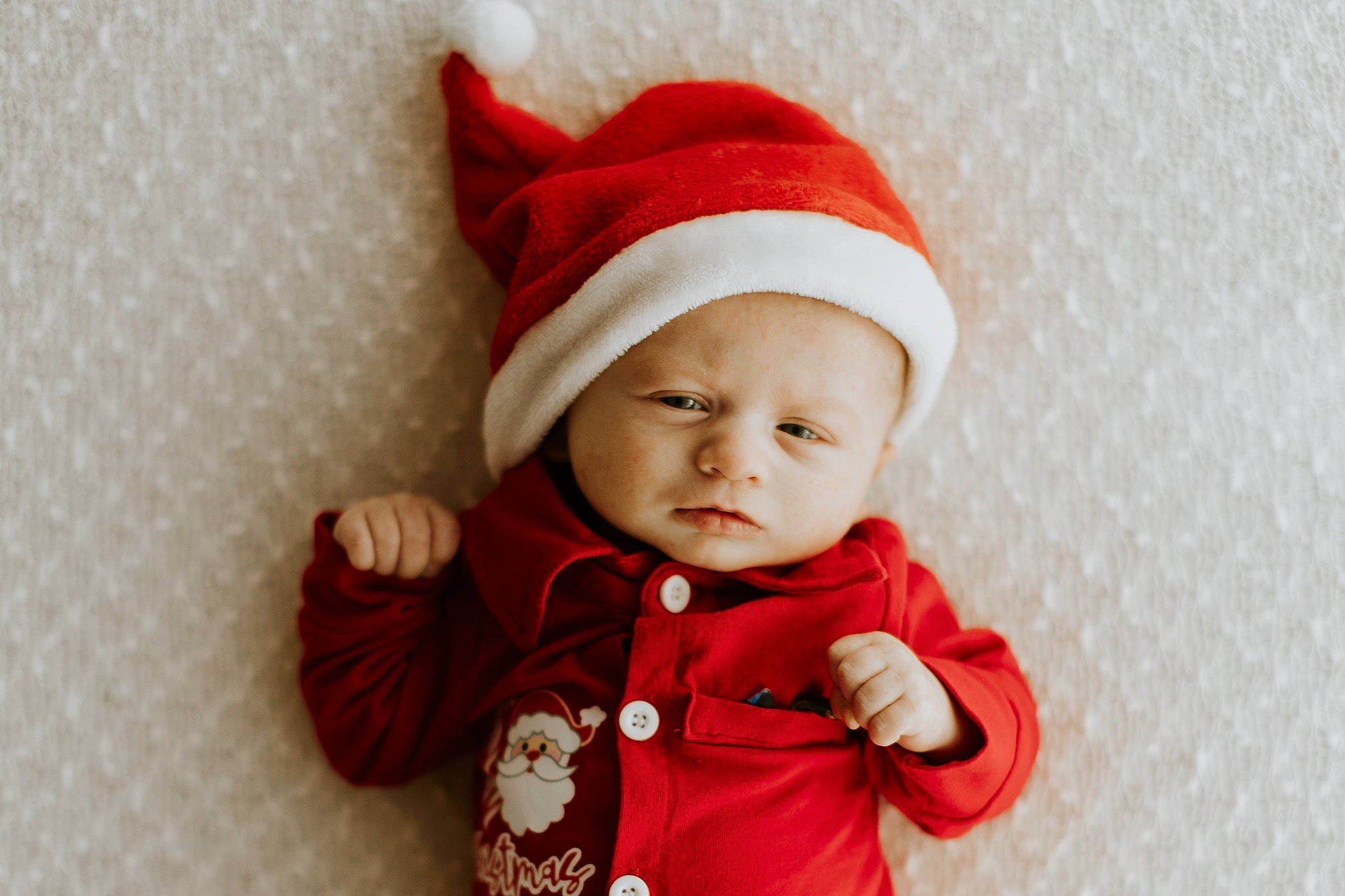 Wyatt is registered to the contest to win money with this photo: baby, baby_toddler_clothing, beanie, cap, carmine, child, collar, comfort, costume_hat, face, fashion_accessory, fur, happy, hat, headgear, jacket, pattern, person, sleeve, textile