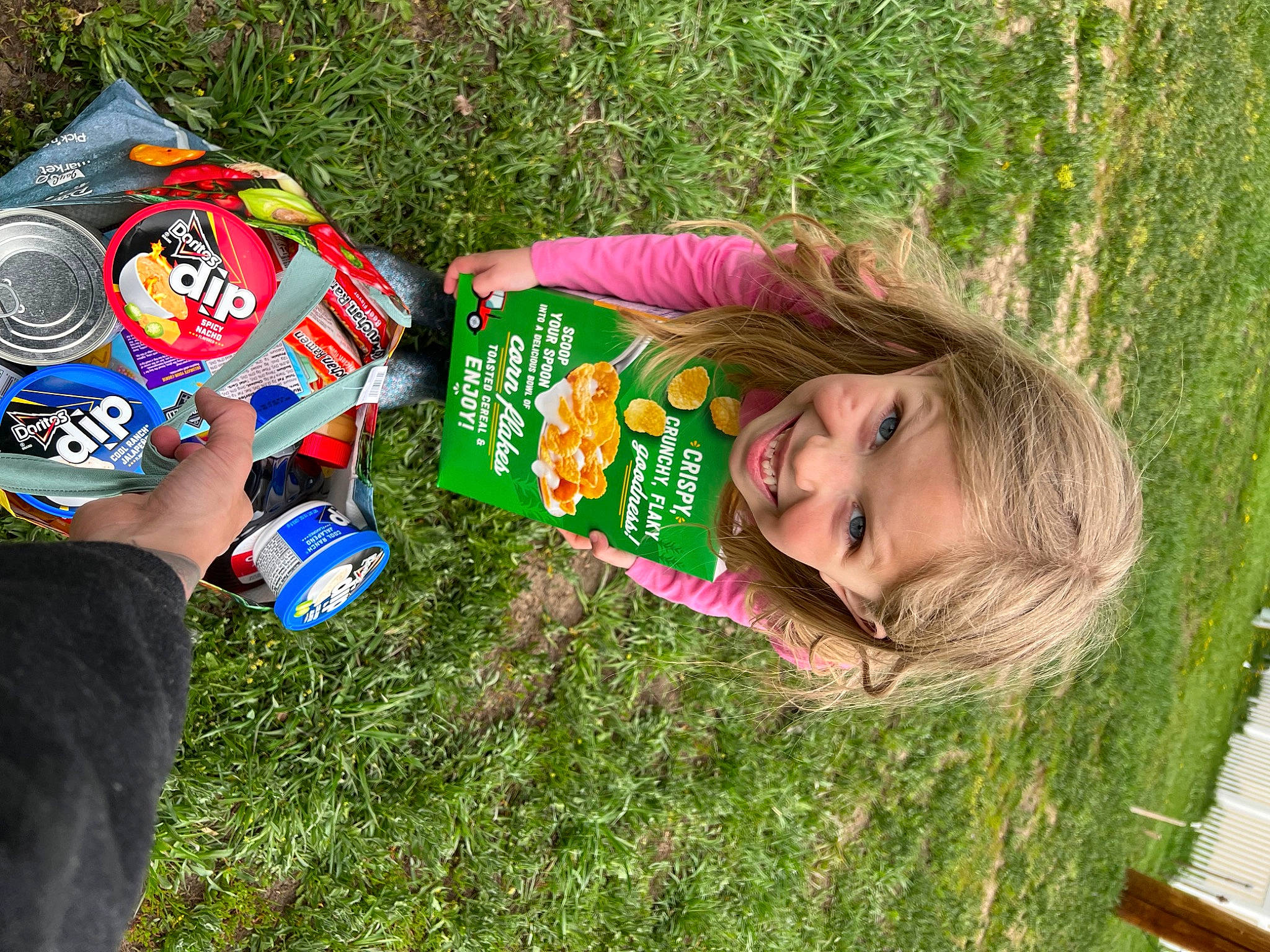 Leora joined the competition — help win amazing prizes! aluminum_can, beverage_can, child, fun, grass, grassland, groundcover, happy, joy, lawn, leisure, logo, pattern, people_in_nature, person, plant, recreation, smile, soil, t_shirt
