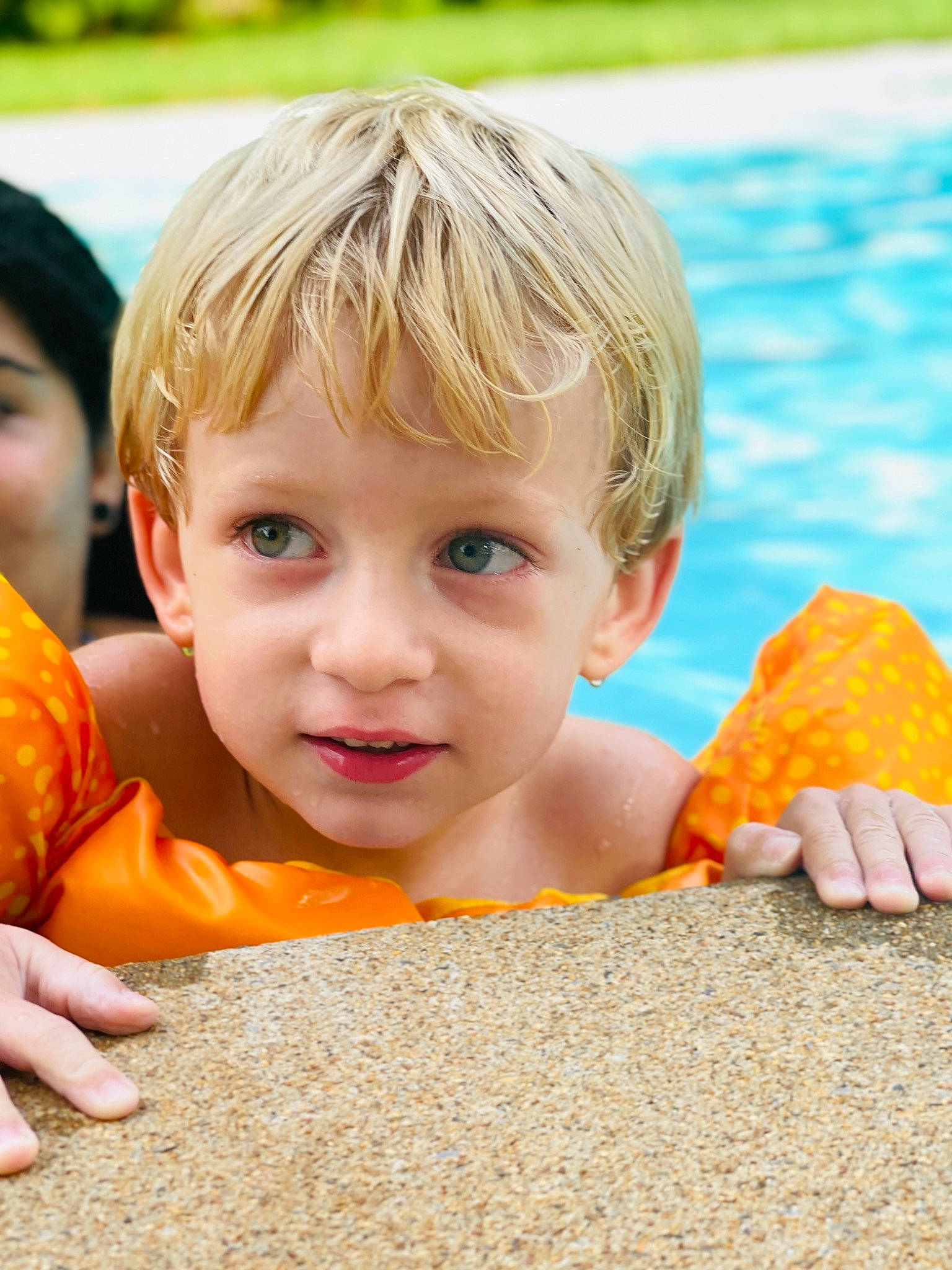 Emrie is registered to the contest to win money with this photo: beach, blond, blurred, child, fun, grass, hairstyle, happy, leisure, people_in_nature, person, play, recreation, sand, sitting, skin, spring, summer, swimming_pool, toddler