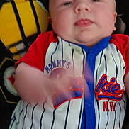 Ashen is registered to the contest to win money with this photo: baby, infant, child, onesie, clothing, striped, red_sleeves, blanket, face, head, motion_blur, cute, person, young, portrait, indoors, soft, cozy, resting, baby_boy