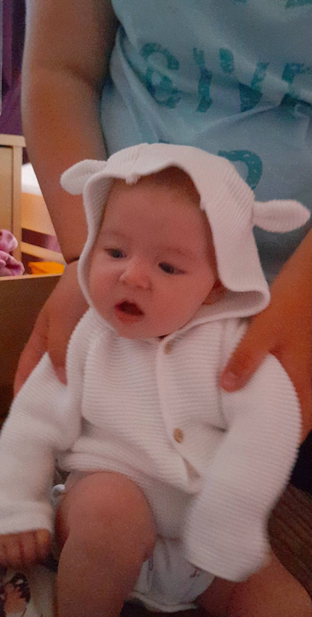 Maisie joined the competition — help win amazing prizes! baby, baby_products, baby_toddler_clothing, cheek, child, chin, comfort, eyelash, facial_expression, happy, hat, iris, lip, mouth, nose, person, skin, sleeve, smile, thumb