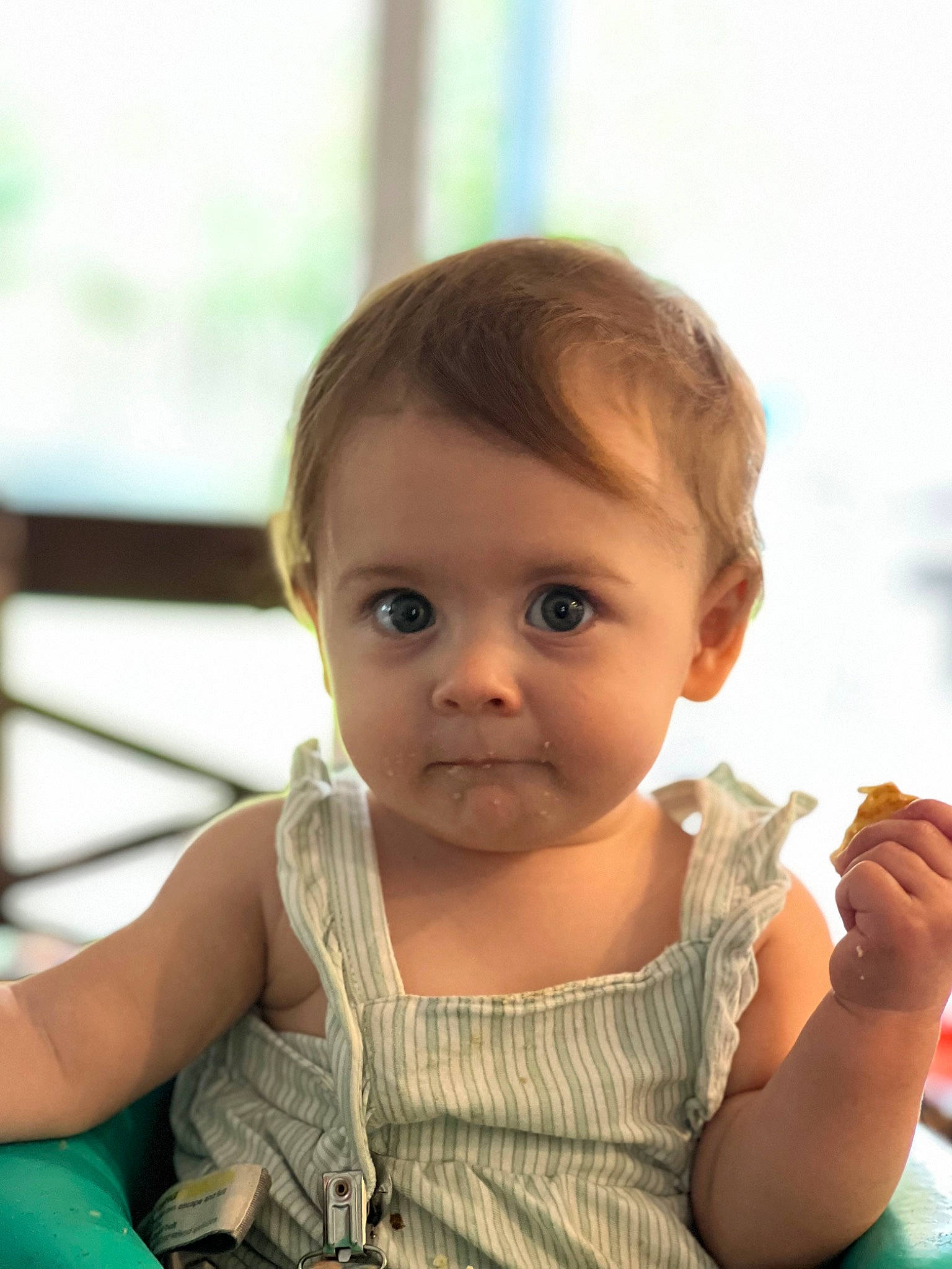 Sage is registered to the contest to win money with this photo: baby, baby_toddler_clothing, cheek, child, chin, eyelash, facial_expression, finger, fun, gesture, hand, happy, iris, lip, nose, person, sitting, skin, sleeve, smile