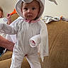 baby, child, infant, ghost_costume, halloween, pumpkin, costume, white_clothing, hood, glowing, couch, indoors, portrait, standing, barefoot, family, playful, cute, face, living_room