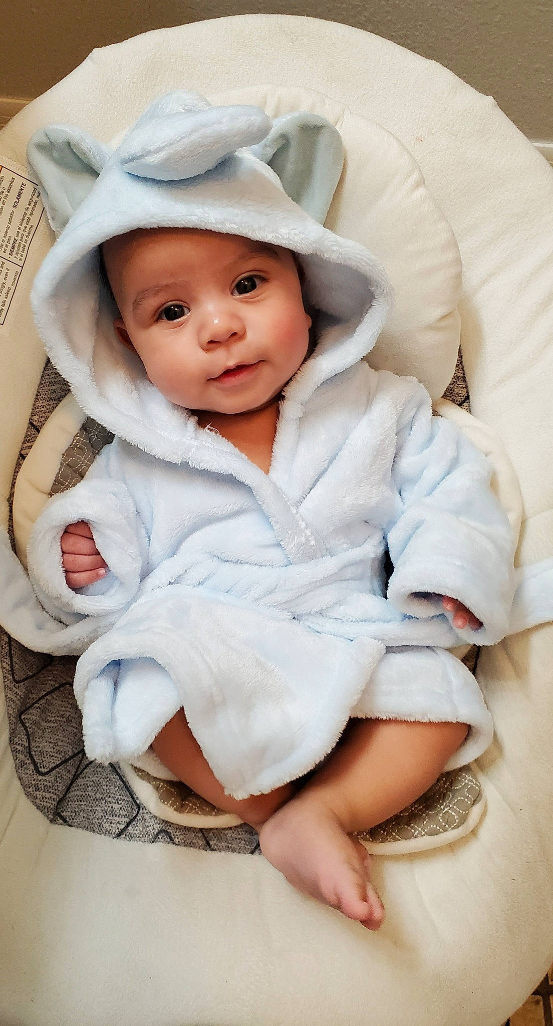 Eliseo is registered to the contest to win money with this photo: baby, baby_sleeping, child, child_model, hat, headgear, headwear, person, product, skin, toddler