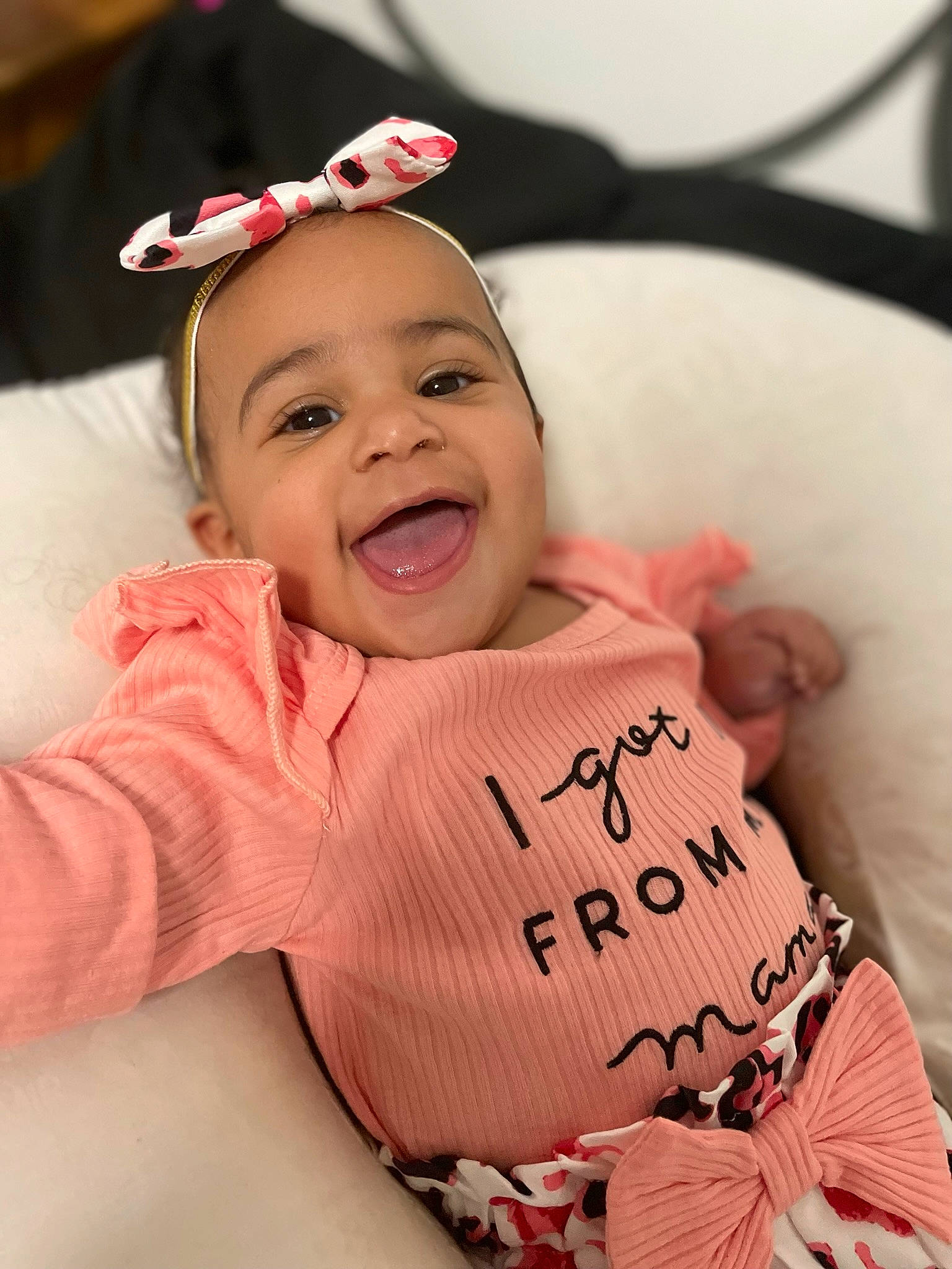 Aria joined the competition — help win amazing prizes! baby, baby_laughing, baby_products, baby_toddler_clothing, cheek, child, comfort, event, fun, gesture, happy, laugh, magenta, peach, person, pink, skin, sleeve, smile, textile