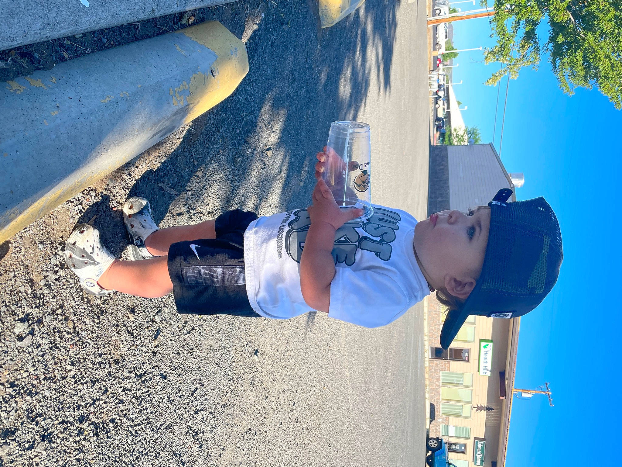 Knoxx is registered to the contest to win money with this photo: asphalt, azure, concrete, denim, elbow, electric_blue, eyewear, fun, headwear, human_leg, knee, leg, leisure, person, road_surface, shadow, sky, thigh, travel, tree