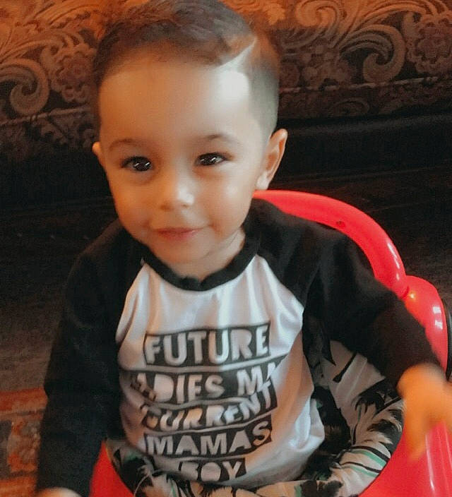 Dominic is registered to the contest to win money with this photo: baby, baby_toddler_clothing, cheek, chin, cool, ear, eyebrow, facial_expression, forehead, happy, human, iris, lip, mammal, nose, person, skin, sleeve, smile, t_shirt