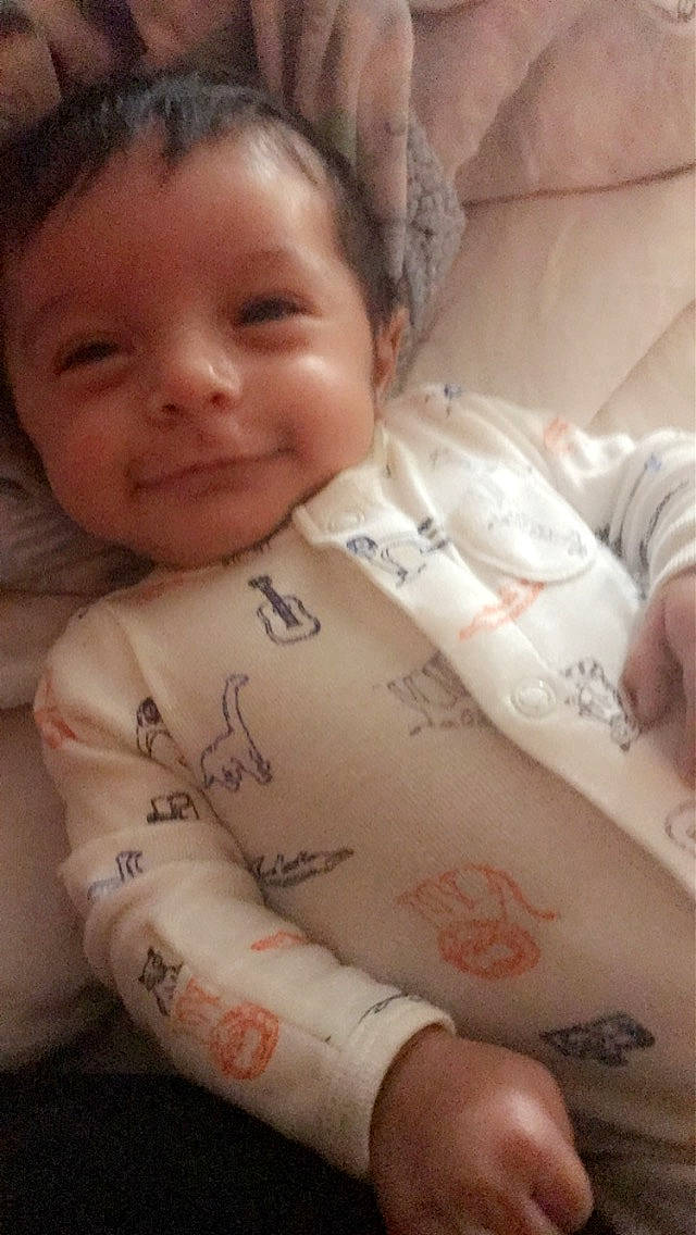 Dominic is registered to the contest to win money with this photo: arm, baby, cheek, child, face, finger, hand, head, joy, lip, mouth, nose, person, skin, thumb, toddler