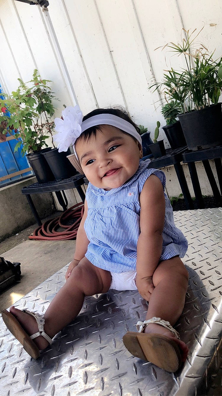 Alyson is registered to the contest to win money with this photo: baby, baby_toddler_clothing, beauty, child, child_model, headgear, joy, leg, person, photography, sitting, skin, smile, snapshot, toddler, vacation