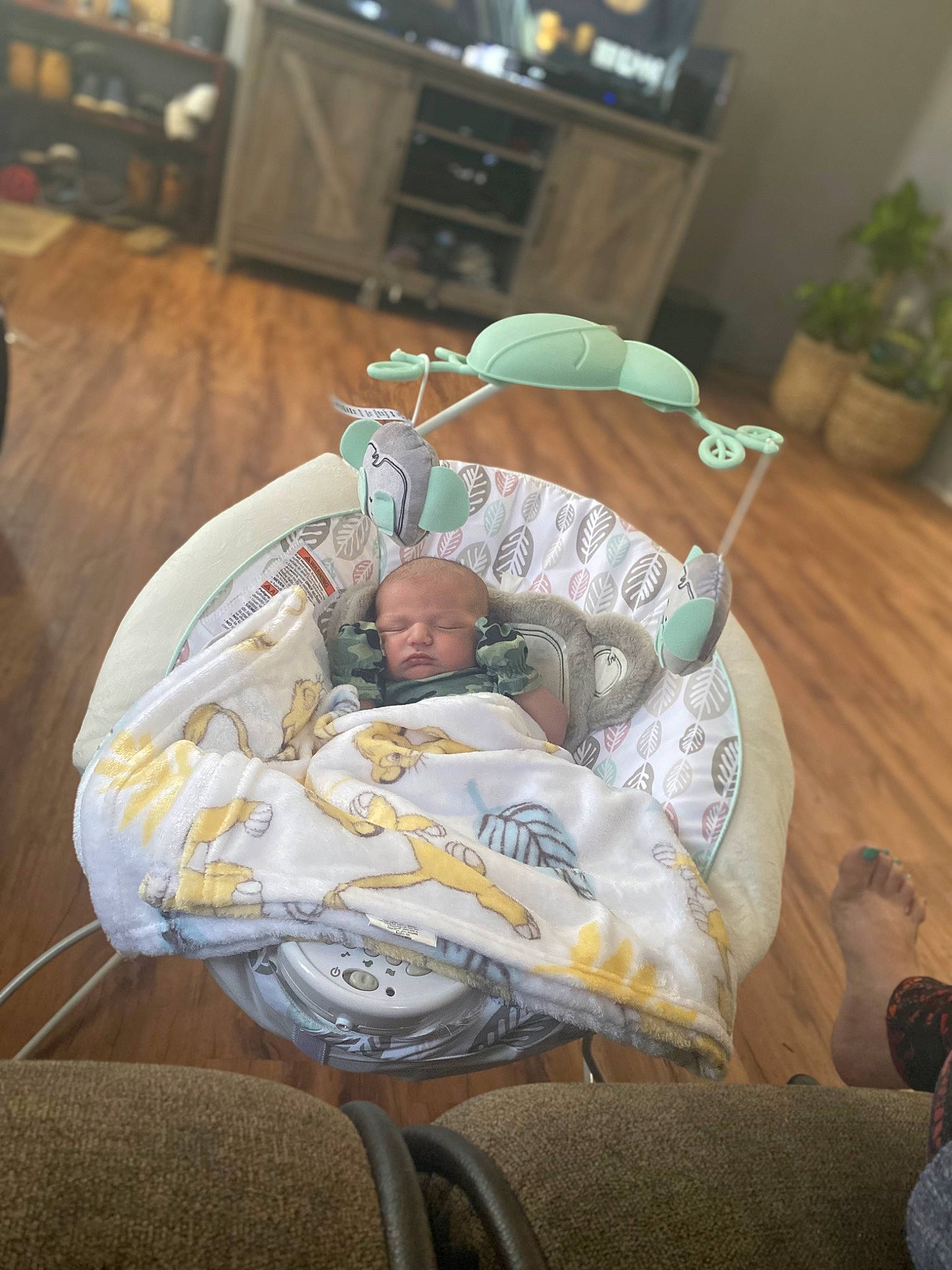 Xayden is registered to the contest to win money with this photo: baby, baby_carriage, baby_products, baby_safety, baby_toddler_clothing, child, comfort, event, flowerpot, hat, hospital, houseplant, infant_bed, linens, nap, person, picture_frame, plant, room, sitting