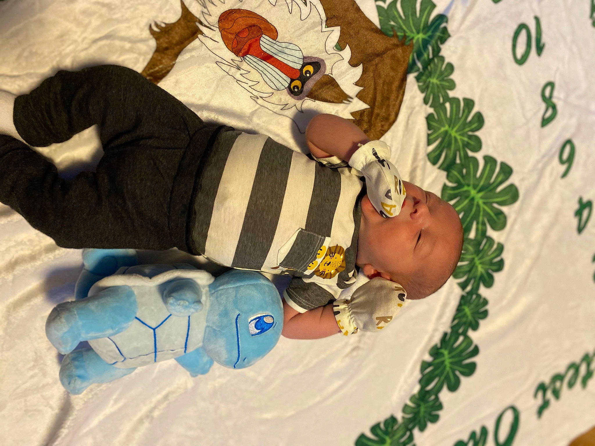 Xayden joined the competition — help win amazing prizes! art, baby, baby_products, baby_sleeping, baby_toddler_clothing, bedding, child, comfort, event, fun, human_body, leisure, linens, pattern, person, product, room, sock, stuffed_toy, textile